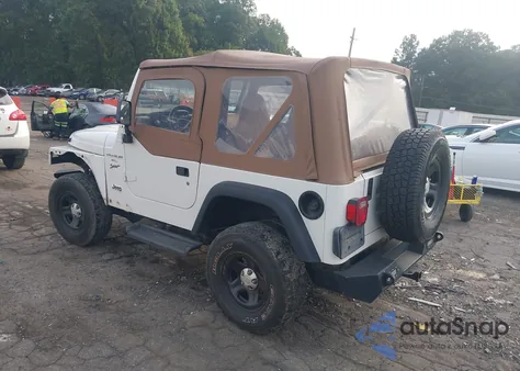 1999 Jeep Wrangler Sport z USA, uszkodzony, nr VIN 1J4FY19S1XP413327